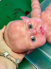 Load image into Gallery viewer, Tutorial on adding baby peachy fuzz to Silicone baby