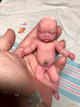 Load image into Gallery viewer, Prototype full body silicone mini baby Milly 4.5” in super soft blend asleep bald with belly button stamp