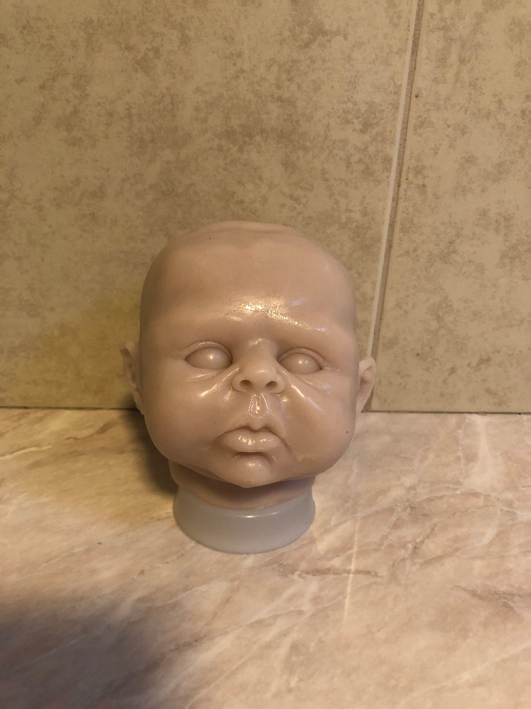 AWAKE Blank (unpainted) silicone head for cuddle baby doll in super soft blend with 3D skin effect