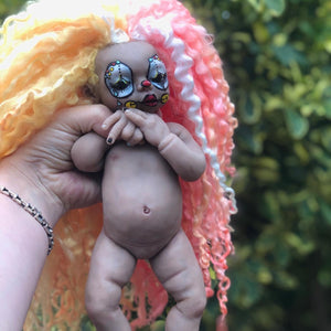 AVAILABLE full body silicone Sad Clown Prada 11.5” (baby girl) in biracial colour in super soft platinum silicone