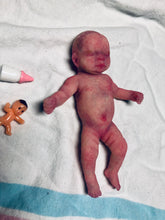 Load image into Gallery viewer, Prototype full body silicone mini kit Milly 4.5” in super soft blend asleep bald
