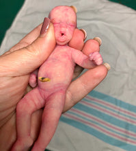 Load image into Gallery viewer, Prototype full body silicone mini baby Milly 4.5” in super soft blend asleep bald with belly button stamp
