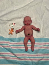 Load image into Gallery viewer, Prototype full body silicone mini baby Milly 4.5” in super soft blend asleep bald with belly button stamp
