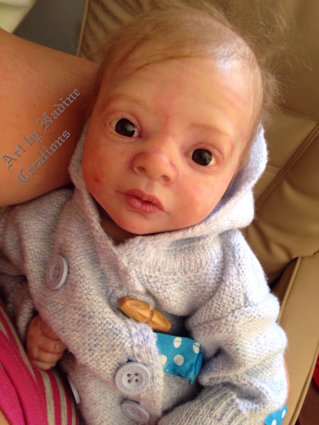 Custom reborn baby doll with rooted or painted hair