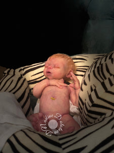 AVAILABLE Prototype full body silicone kit Prada 11.5” (baby girl) in super soft blend asleep in  super soft platinum silicone