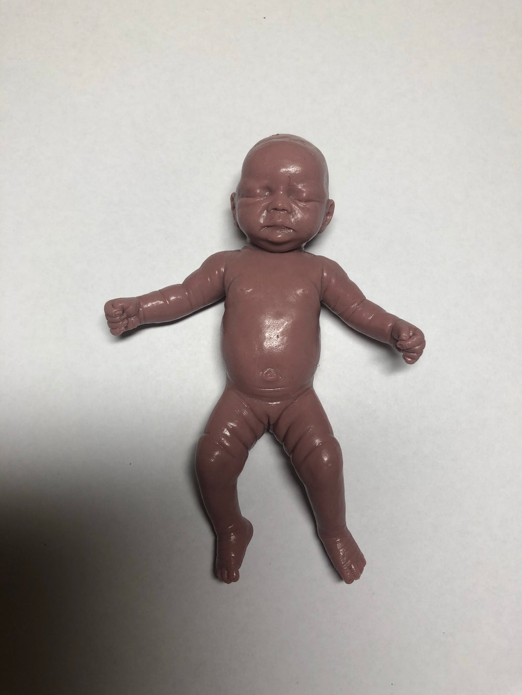 Blank (unpainted) full body silicone mini kit Milly 4.5” in super soft blend in dark biracial colour